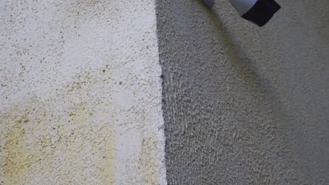 Two security cameras on a brick elementary school, looking out over a parking Video stock 76862803