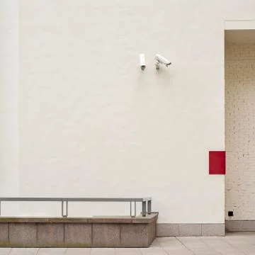 Two security cameras CCTV on the wall Stock Photos