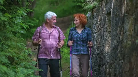Two senior hikers hiking Stock Footage 54359166