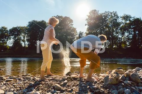 Two senior people enjoying retirement and simplicity Stock Photos