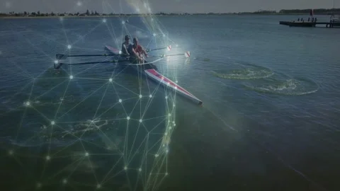 Two senior rowers starting synced strokes for fitness on lake, digital network Stock Footage 332843860