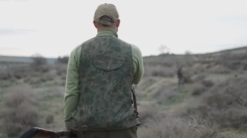 Two separate hunters talking in Spain Stock Footage 270254877
