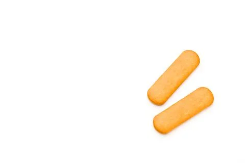 Two separated golden rectangular crackers in minimal white composition Stock Photos