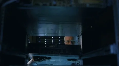 Two Server Engineers Install Hardware in Server Rack. Stock Footage 74630320