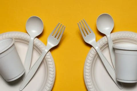 Two sets of disposable biodegradable cookware made from corn starch Stock Photos