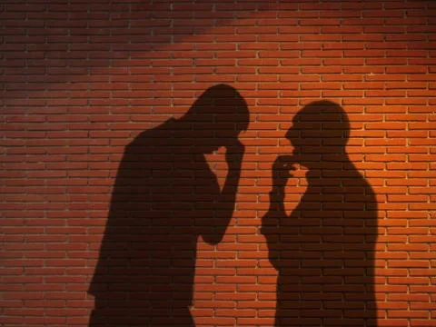 Two shadow chatting Stock Photos