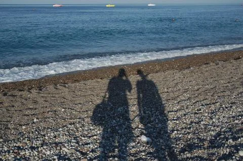 Two shadows on the beach Foto stock