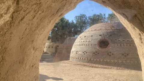 Two shadows outside of an arched window Stock Footage 128665065