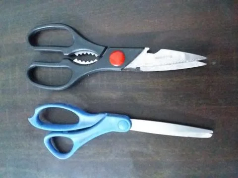 Two sharp scissors Stock Photos