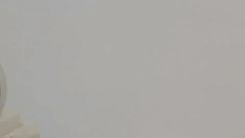 Two shining wedding rings in a box on white background. Close up macro . Stock Footage 102699231