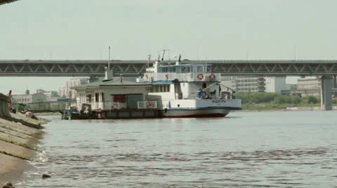 Two ship moored under the bridge Stock Footage 26847406