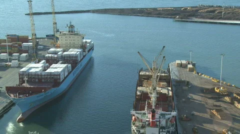 Two ships being loaded time lapse Stock Footage 754105