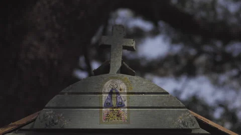 Two shots of different angles of a small rustic chapel made of wood and painted  Video stock 163339475