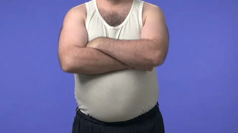 Two shots of hairy bouncer posing. One with jewelry and one without. Stock Footage 45935037