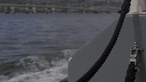 Two Shots Of A Slow Motion Boat In Pearl Harbor, Hawaii Stock Footage 154500549