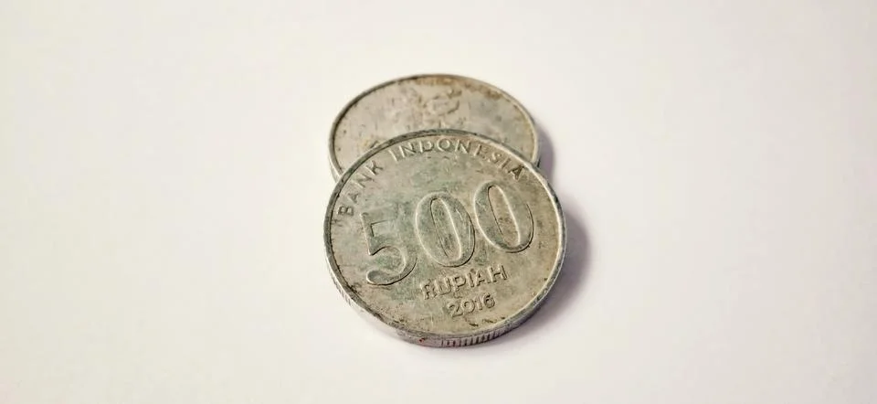 Two side of old 500 rupiah coin from Bank Indonesia Stock Photos