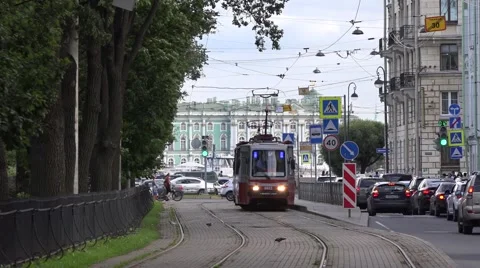 Two-sided single tram departs from a stub terminus opposite to Hermitage museum Stock Footage 67468176