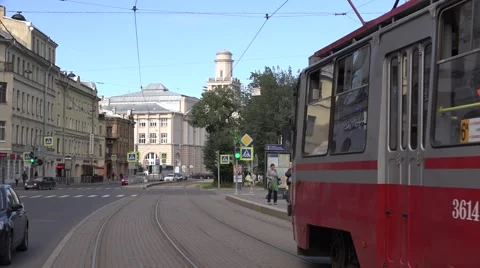 Two-sided tram on temporary route 6A arrives to a stop Stock Footage 67468160