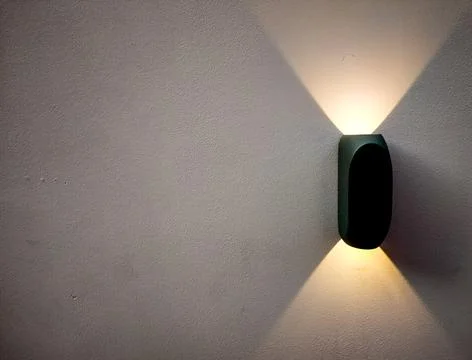 Two sided wall light with yellow light Foto stock