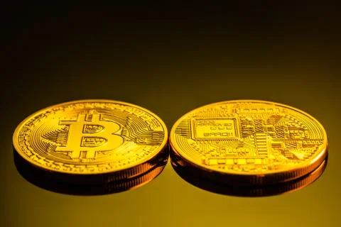 Two sides of a bitcoin Stock Photos