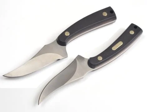 Two sides of a knife on a white background Stock Photos