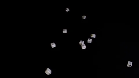 From two sides white cubes fly out on a black background. The dice rotate and Stock Footage 129872821