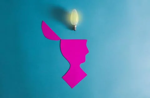 Two silhouettes of a head, on a green background. Dialogue, negotiations, and Stock Photos