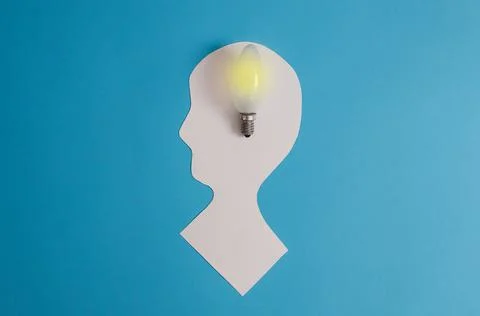 Two silhouettes of a head, on a green background. Dialogue, negotiations, and Stock Photos
