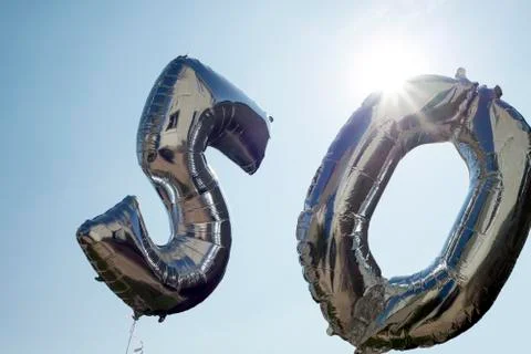 Two silver balloons for a 50th Stock Photos