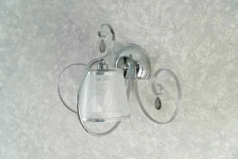 Two silver lamp have light gray wall is background for interior design. The l 스톡 사진
