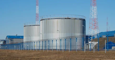 Two silver metal barrels for storing oil or oil products. Stock Footage 127119262