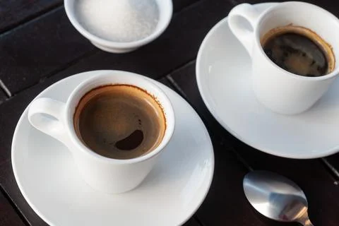 Two single and double cups of espresso coffee Foto stock