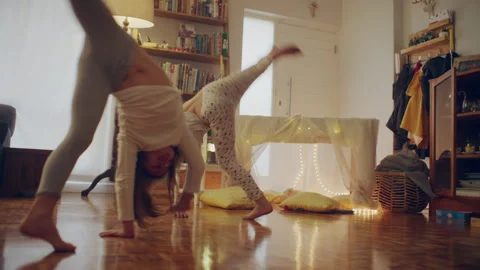 Two sisters doing a handstand Stock Footage 279740093