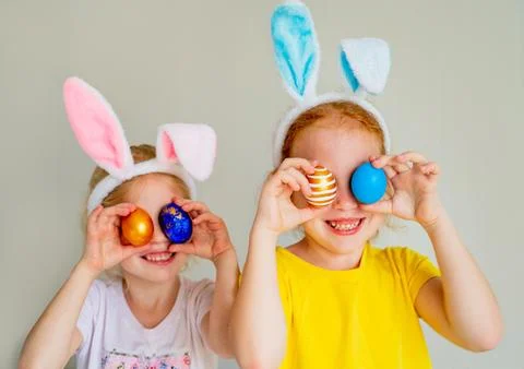 Two sisters on Easter holiday Stock Photos