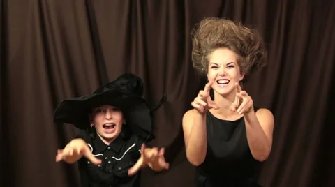 Two sisters playing Halloween Stock Footage 11632299