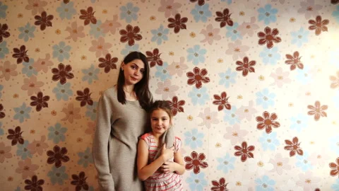 Two sisters posing in front of the camera Stock Footage 94059664