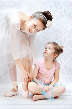 Two sisters practising ballet dance Stock Photos