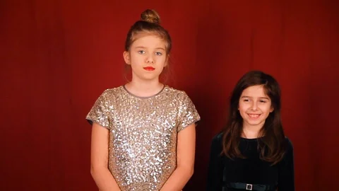 Two Sisters Try Not To Laugh and Fail Stock Footage 115961308