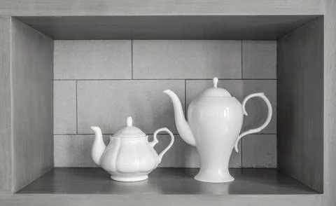 Two sizes of white ceramic Tea pot - side view Stock Photos