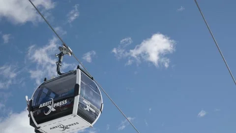 Two ski lifts passing each other Stock Footage 231550610