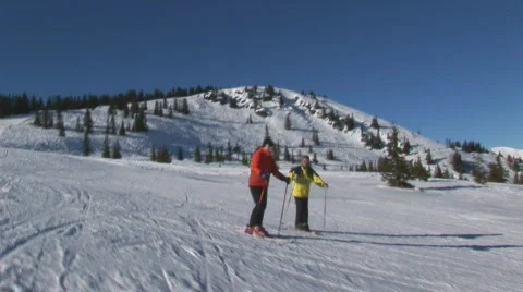 Two skiers ready to go Stock Footage 92440