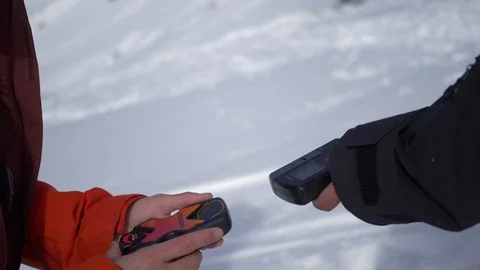 Two Skiers Testing their GPS trackers Stock Footage 130077450