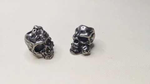 Two skulls on a white background Stock Photos