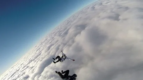 Two skydivers are having fun Stockbeeldmateriaal 76622958