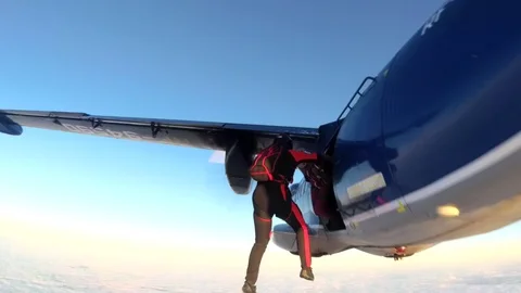 Two skydivers. Exit. Slow motion. 스톡 동영상 86507730