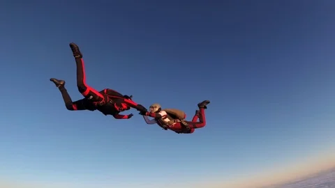Two skydivers. Slow motion. Stock Footage 86507779
