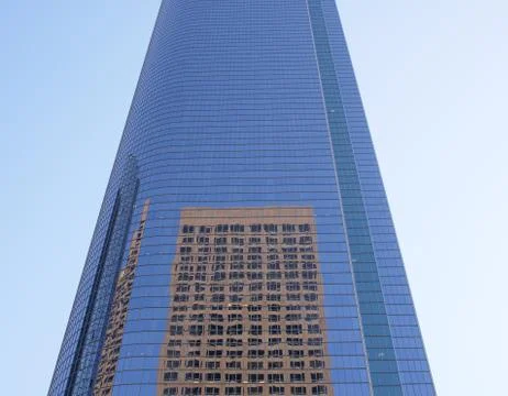 Two Skyscrapers One Reflected Within the Other Stock Photos