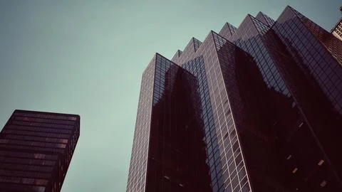 Two skyscrapers standing tall next to each other Ilustração Stock