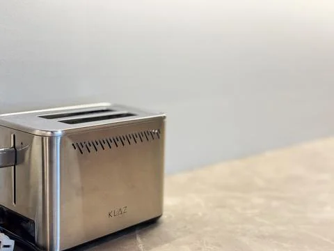 Two-slice electric toaster with a brushed stainless steel finish Stock-Fotos