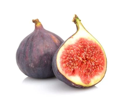 Two sliced figs lengthwise in half, isolated on white background Stock Photos